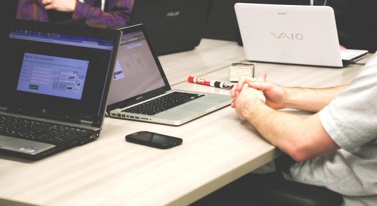 Laptops, meeting, businessmen — Get the Nangs You Need Delivered Right to Your Door